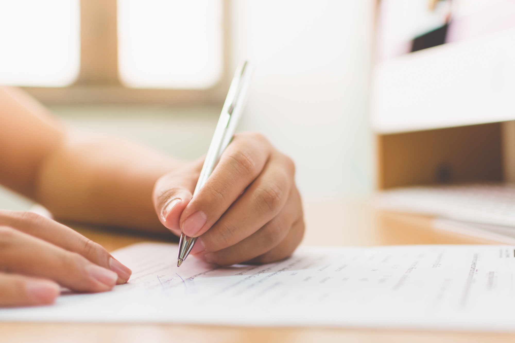 Businessman hand signing the document business contract agreement